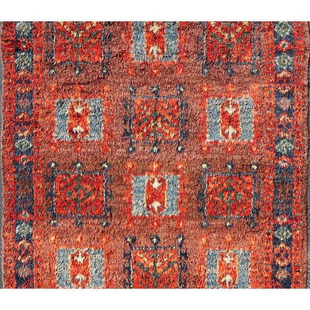 Tribal Vintage Turkish Tulu Rug With Bold Red Field and Blue Geometric Motifs For Sale - Image 3 of 12