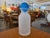 Add a touch of Scandinavian-inspired post-modern elegance to your home decor with this striking frosted glass bottle....