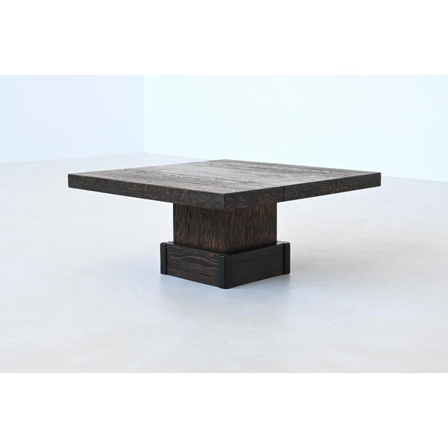 This sculptural square coffee table is a strong example of French Brutalist design from the 1970s. Crafted entirely from...