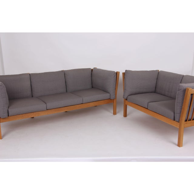 Two beautiful classic sofas, designed by andreas hansen and brdr. Andersens møbelfabrik. Sofa models ah302 and ah303....