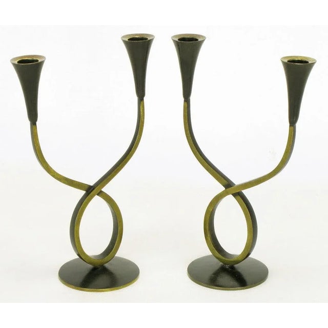 Pair of pantinated brass double arm candelabra, possibly a Hagenauer design by Rena Rosenthal, made in Austria. Patinated...