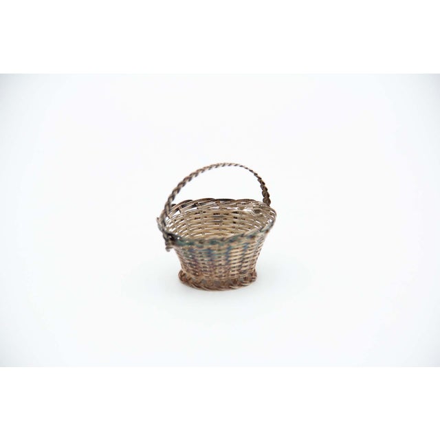 Silver Wire Basket with Circular Base, in Very Good conditions. Designed 1920 to 1949 This piece has an attribution mark,...