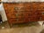 This 19th c. French Transitional Walnut Inlaid Commode is a beautiful and functional piece of furniture. Featuring...