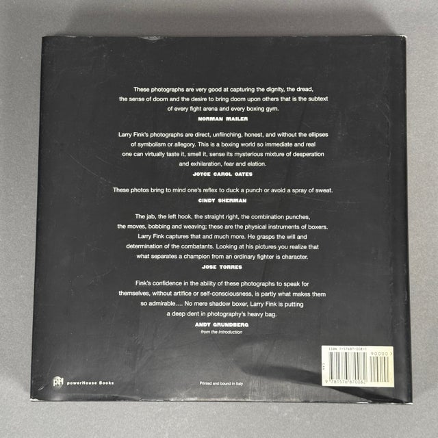 Rare 1997 First Edition of this large format boxing photography book, printed and bound in Italy. Filled with candid black...