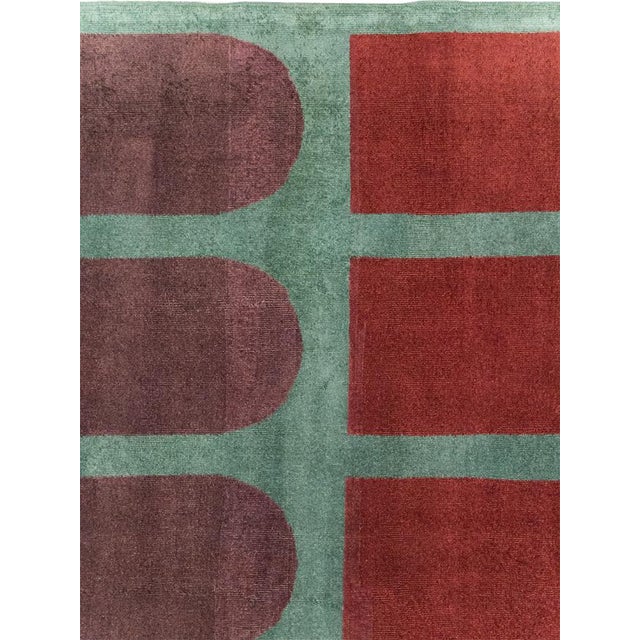 This Mid-20th century Turkish Anatolian Deco Style carpet presents a bold, minimalist composition defined by repeated...