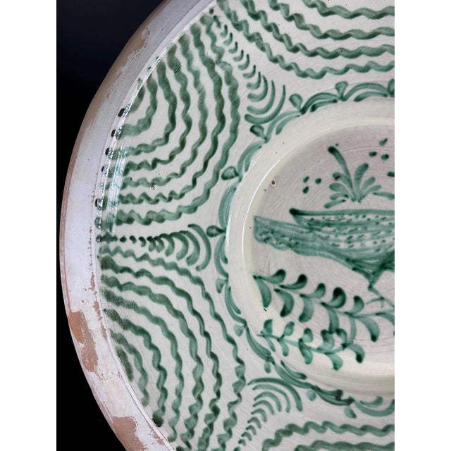 Large Spanish handmade and painted white and green glazed terracotta "Lebrillo" earthenware bowl in the style typical of...