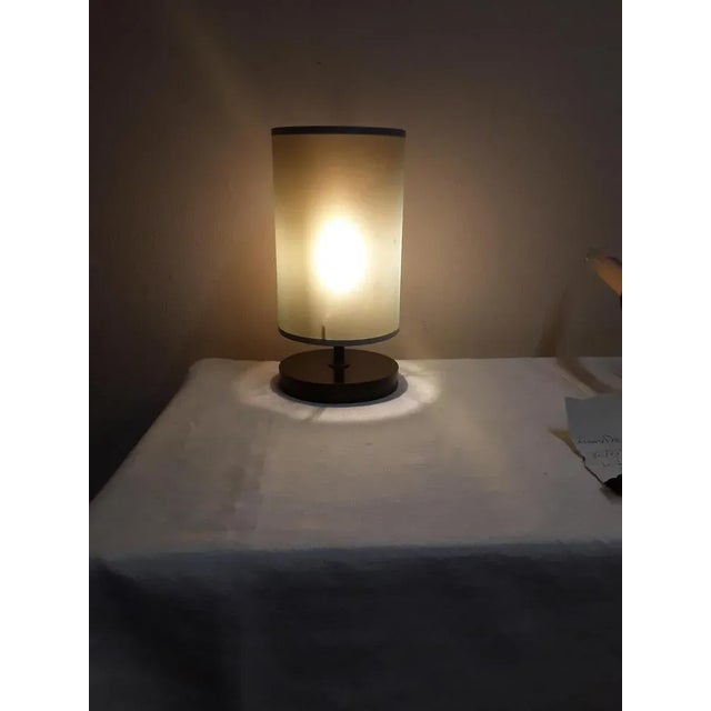 Vintage table lamp from the 90s with brown pine wood base and blue edged plastic shade European Plug (up to 250V).The...