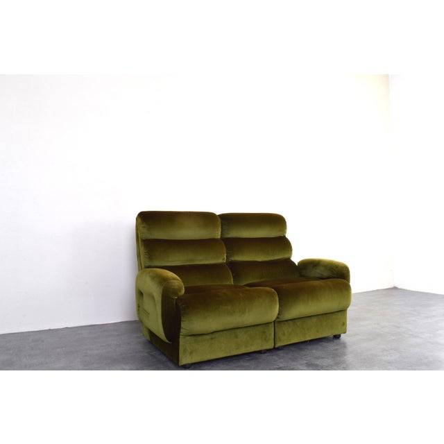 This two-module sofa was manufactured in Germany in the 1970s. The sofa is upholstered in original green velvet fabric and...