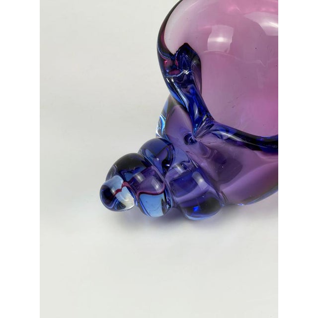 A vintage Murano Sommerso glass conch shell sculpture by Alfredo Barbini, made in Italy during the 1970s, combining deep...