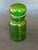 This vintage green glass apothecary jar will add a dramatic color pop to your home decor. Use the decorative glass bottle...