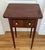 beautiful little antique side table. Sat in my living room for many years and goes along well with any decor.