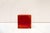 Solid red glass paperweight cube. Made in Italy 1960s