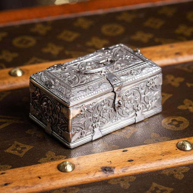Antique 19th Century Indian Madras solid silver casket. Richly decorated throughout with dense repoussé and chased floral...