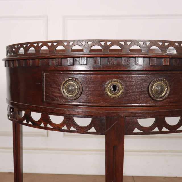 Pretty early 19th century Dutch oak demi-lune console. 1830. This piece is designed in the style of the selected designer...