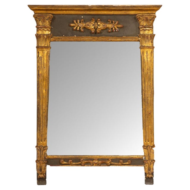 Empire Period Giltwood Mirror with Relief Decoration France, circa 1805–1815 This refined Empire-period mirror exemplifies...