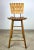 Classic mid century modern bar stool in the style of Arthur Umanoff. Seat slats are maple and the base is pine. A black...