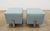 A pair of Lillian August Danielli Ottomans showcasing a sleek contemporary design with clean architectural lines and a...