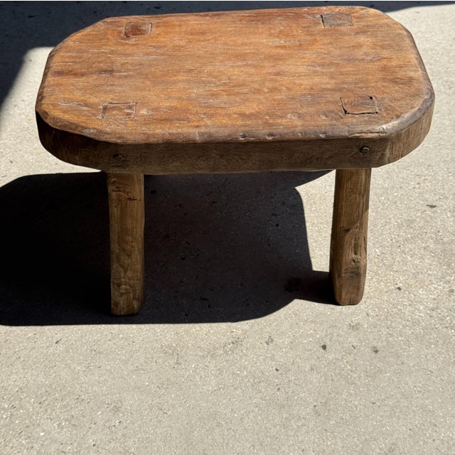 Small stool, oval wabi-sabi style side table in solid teak. Minimalist, raw design, a beautiful piece (thickness and...