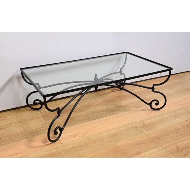 This rectangular wrought iron coffee table, dating from 1940, is a remarkable example of the art nouveau style. The white...
