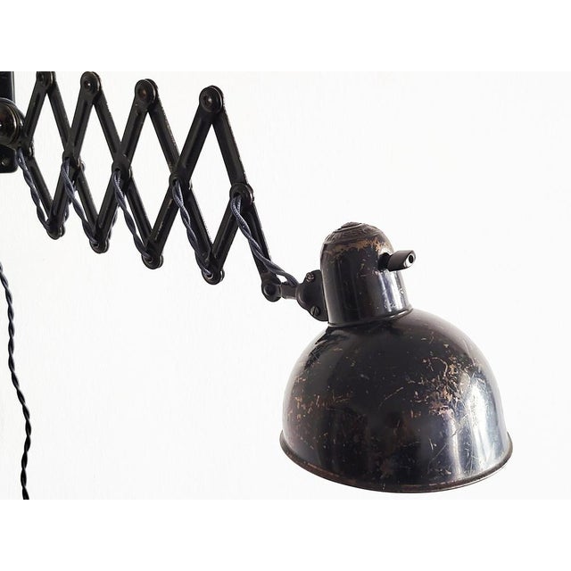 1930s workshop scissor arm lamp designed by Bauhaus designer Christian Dell for Kaiser Idell Leuchten, Germany. Needs one...