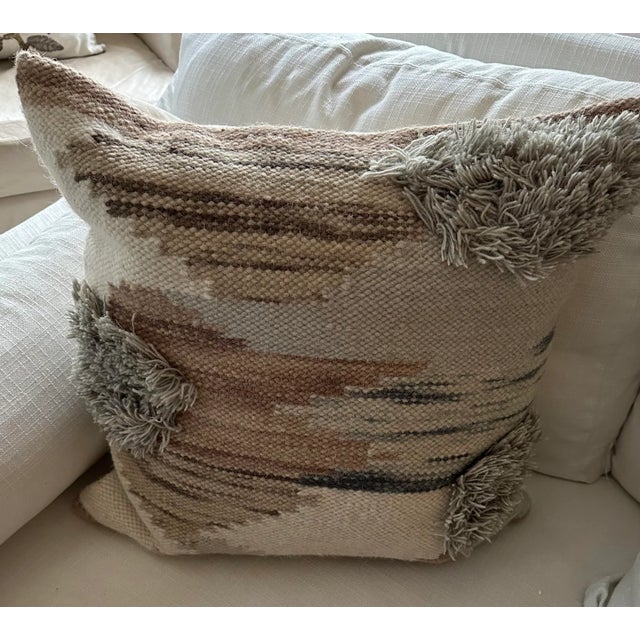 Ellen DeGeneres woven light blue and tones of brown woven wool pillows . Each measure 22 x 22“. Linen backing. Fiber...