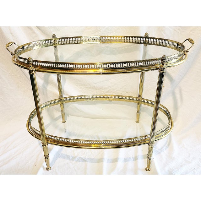 Perfect compliment to any bar, dining area or living space, a solid brass 2 tiered tea table (add caster for a cart) with...