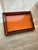 Beautiful glossy orange and espresso brown mid-century modern lacquered tray set, rectangular. Hermes inspired. Lots of...
