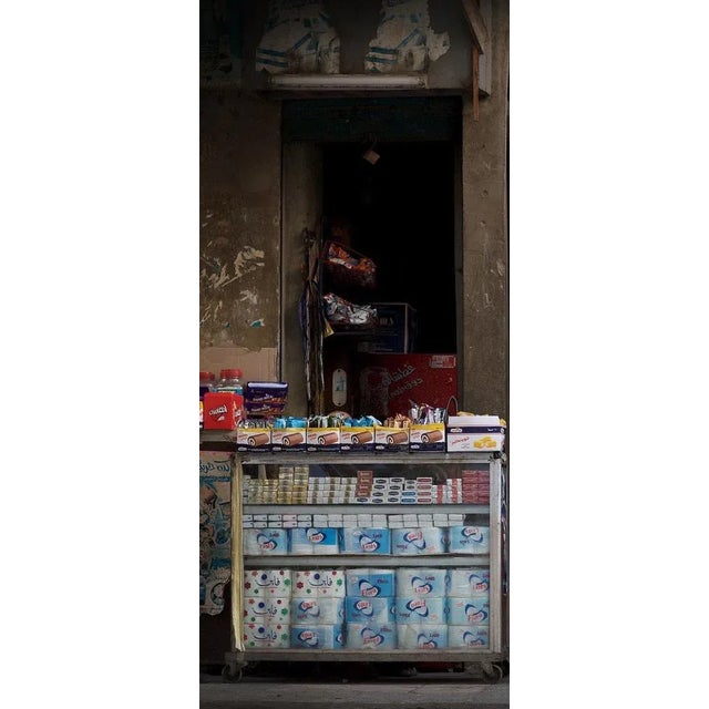 Copts 02 - signed limited edition archival pigment print, 2012 - edition of 5 little girl at the entrance of a store, in...