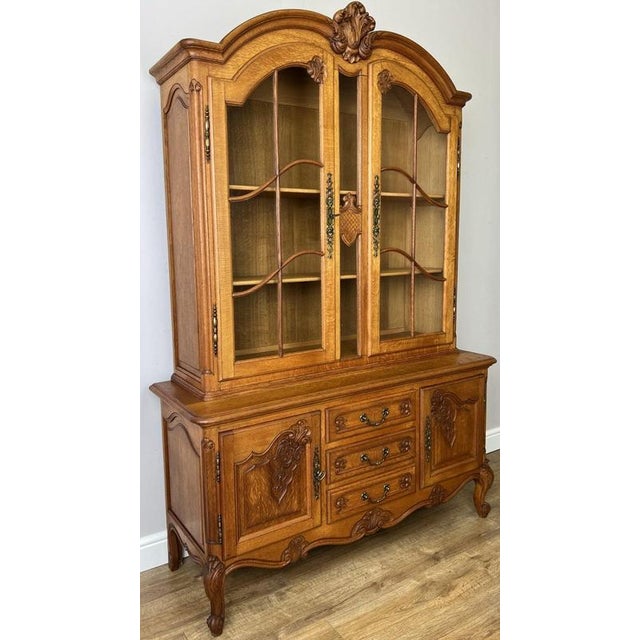 Add timeless French elegance to your home with this Vintage French Louis bookcase , beautifully crafted from oak and...
