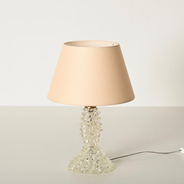 Spectacular and unique large table lamp in mouth-blown “rostrato” murano glass and brass and completed by a light pink...