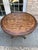 This is a remarkable vintage handcrafted Italian dining table.. The apron has four carved designs with scrolls. The top is...