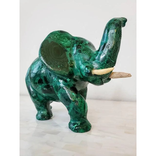A magnificent very large carved and polished Malachite elephant. This impressive specimen was hand-carved in Asia out of...