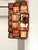 Elegant contemporary wall sconces made in amber-Rosè Murano glass “squared” elements. “Squared ” are blown inside a wooden...