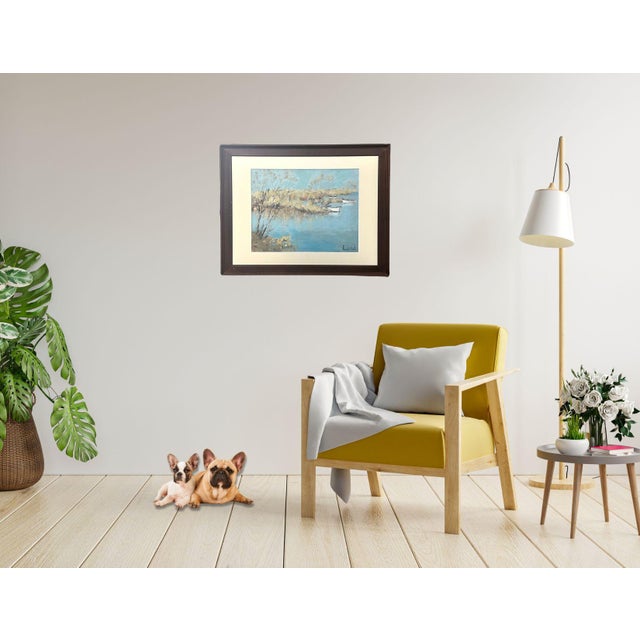 Atmospheric oil on board of the Normandy coast, signed lower right. Pale trees lean gently over the shoreline, their...