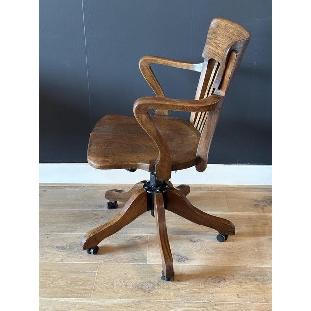 Classic oak desk chair with a light brown leather seat. Beautiful appearance and comfortable chair for daily use. The...