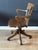 Classic oak desk chair with a light brown leather seat. Beautiful appearance and comfortable chair for daily use. The...