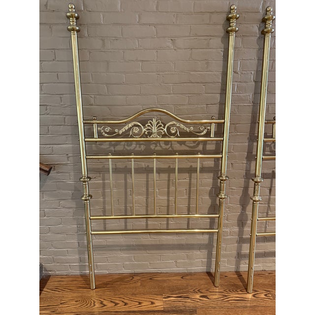 Victorian-style brass headboards with beautiful scrolling detail. Structurally solid but each headboard has one small...