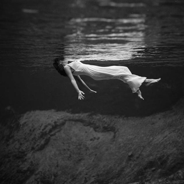 Floating by Toni Frissell A model floats in an evening dress, shot from underwater, 1947. (Photo by Toni Frissell) 16x16"...