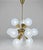 Mid-century Sputnik chandelier with a radial glass composition, designed to create a dynamic and evenly diffused light...
