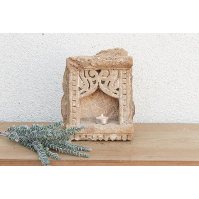 Carved from solid stone, this antique wall niche—traditionally known as a Gokha—was originally embedded into the masonry...