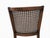 Beautiful vintage cane back armchair with a classic solid wood frame and soft floral upholstery. This charming accent...