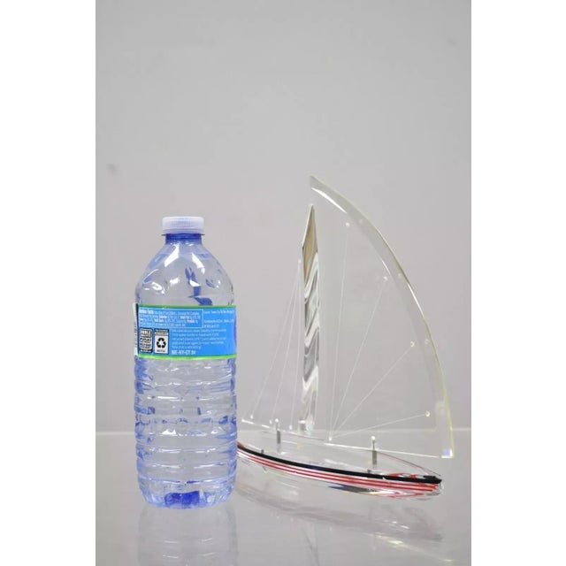 Vintage 9" Lucite Sculpture of Sailboat Artist Signed "J. Fenri 95". Circa Mid 20th Century. Measurements: 9" H x 8.5" W x...
