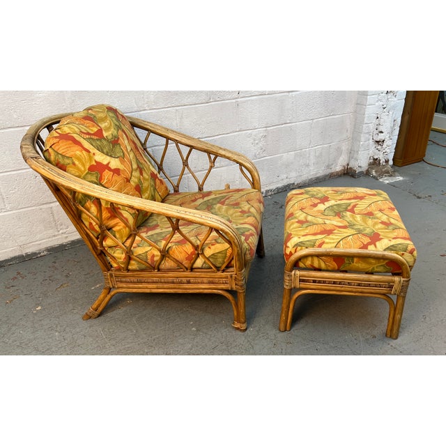 Bring relaxed coastal elegance to your home with this beautiful vintage Ficks Reed style rattan lounge chair and matching...