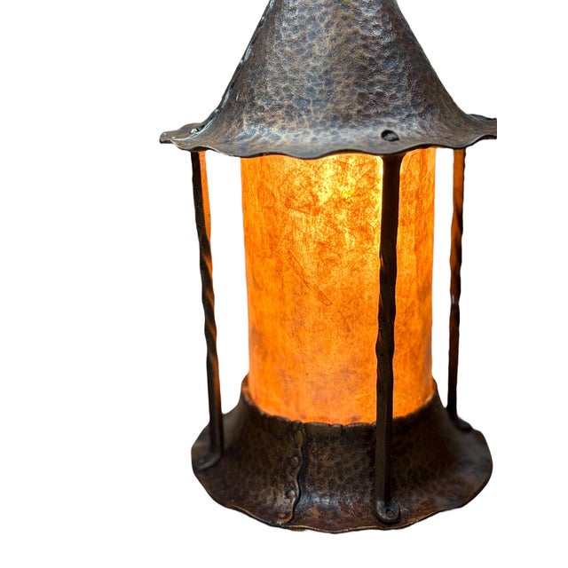 Sconces in the Storybook style, popular in the 1920s and 1930s. They have a hand hammered look but are cast in aluminum....