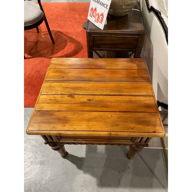 This Thomasville Ernest Hemingway Collection carved end table blends classic styling with enduring craftsmanship....