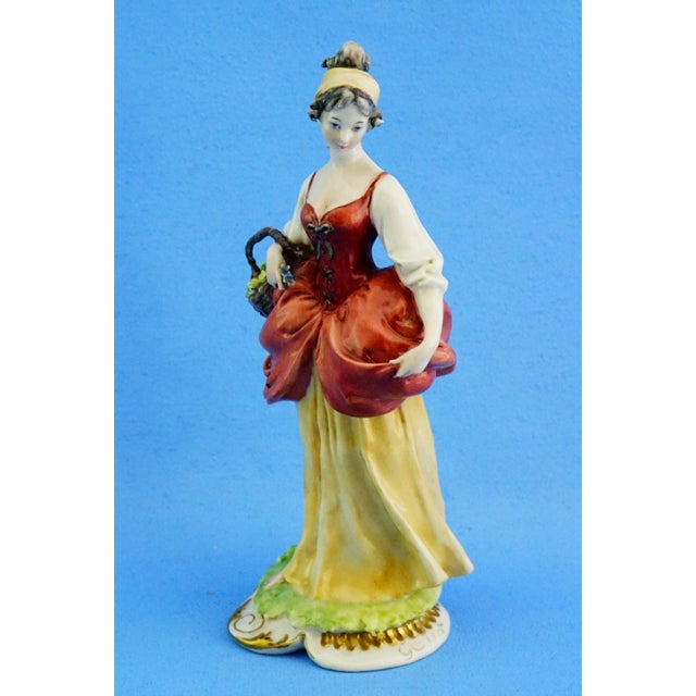 Measurements: height: 18 cm; width: 8.5 cm; depth: 7.5 cm item : polychrome, vitrified hard-paste porcelain sculpture...