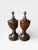 A refined pair of vintage turned wood urn-form finials featuring elegant faceted bodies, hand-turned finials, and a rich...