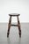 Offered here is this timeless antique English Windsor stool from the 18th century with a wonderful patina. This charming...