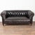 20th century leather Chesterfield 5.5' long bench seat sofa. Classic Chesterfield form with rolled arms, tufted button...