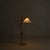 Rooted in the principles of Scandinavian Modern, a 1970s Danish floor lamp in beech, attributed to Domus, with its...